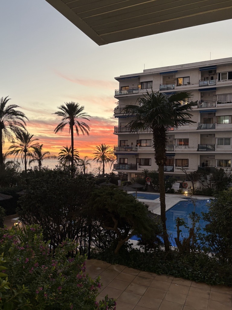 Sunset from the terrace — pool & sea view